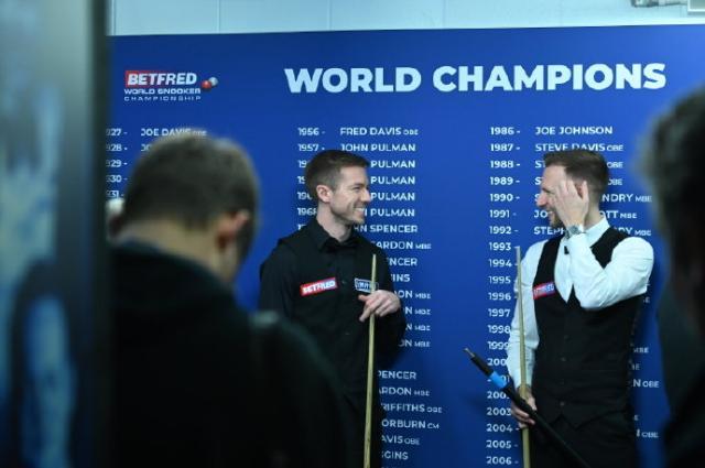 半岛体育官网-特鲁姆普力克麦克吉尔晋级 罗伯逊轰147仍遭淘汰